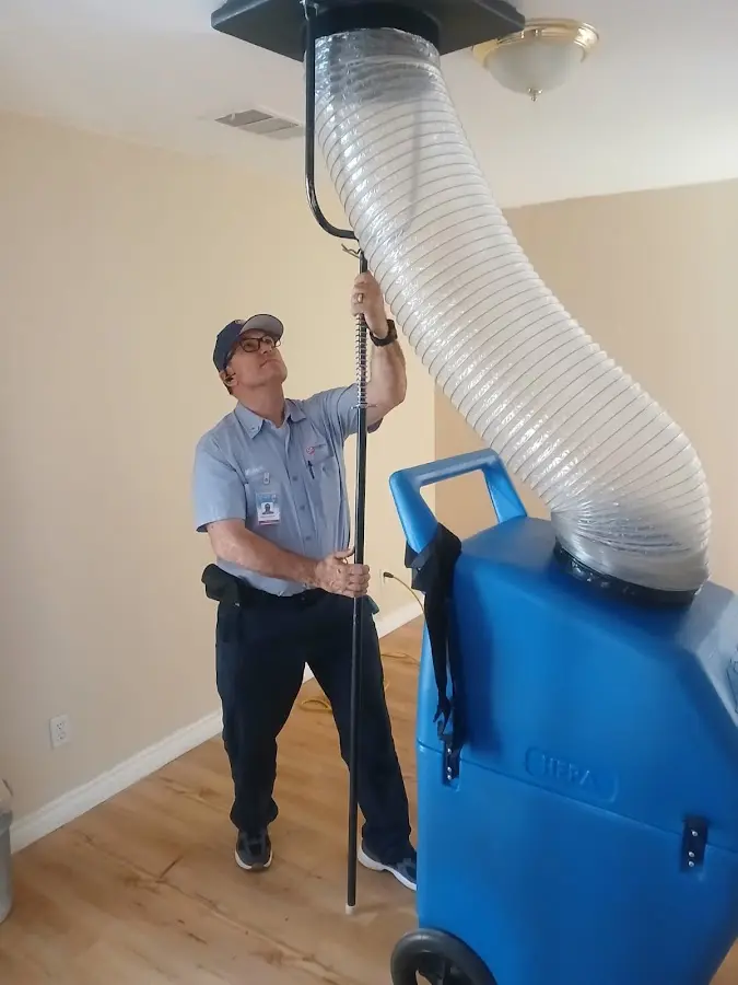 HVAC Installation technician using HEPA equipment in Little Silver